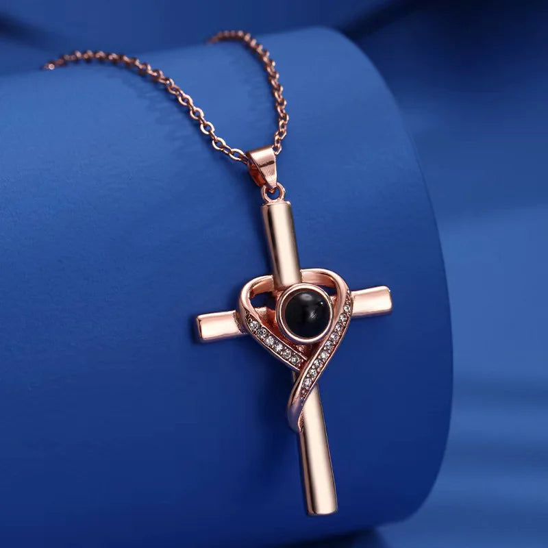 ✝️: Cross with Heart Shaped Pendant